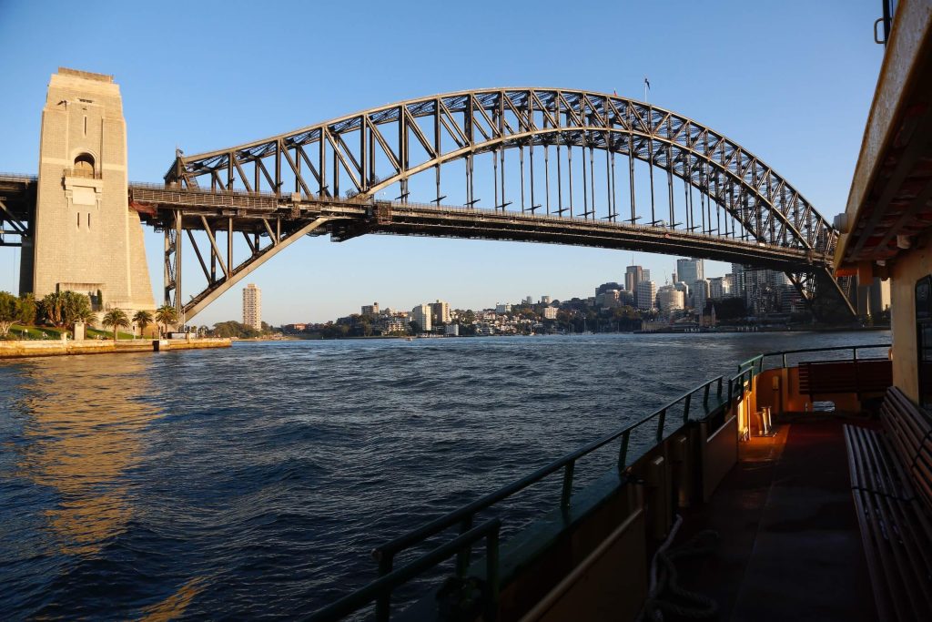 A view of the Sydney Harbour Bridge from a Sydney Ferry in the morning light
