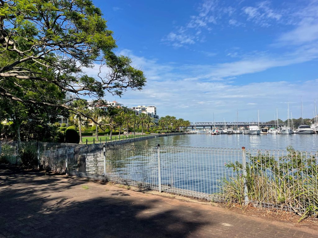 The path around the foreshore at Balmain looking out toward Iron Cove Bridge