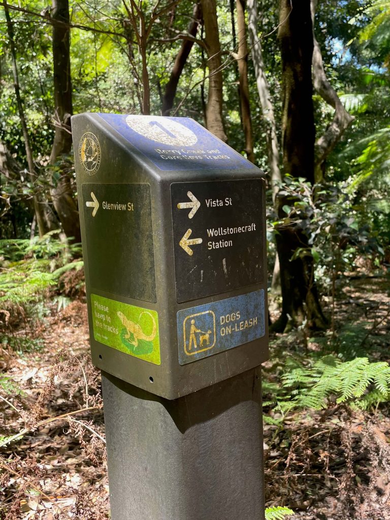 Directional signage alongside Berrys Creek